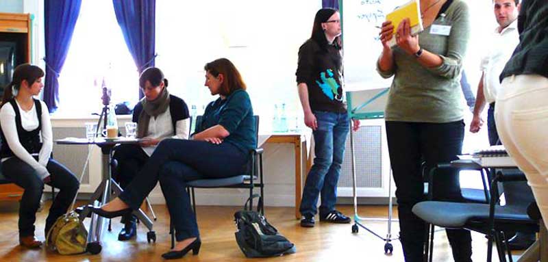 Bild zeigt Gruppe bei einem Moderationsworkshop